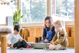 A student teaching children